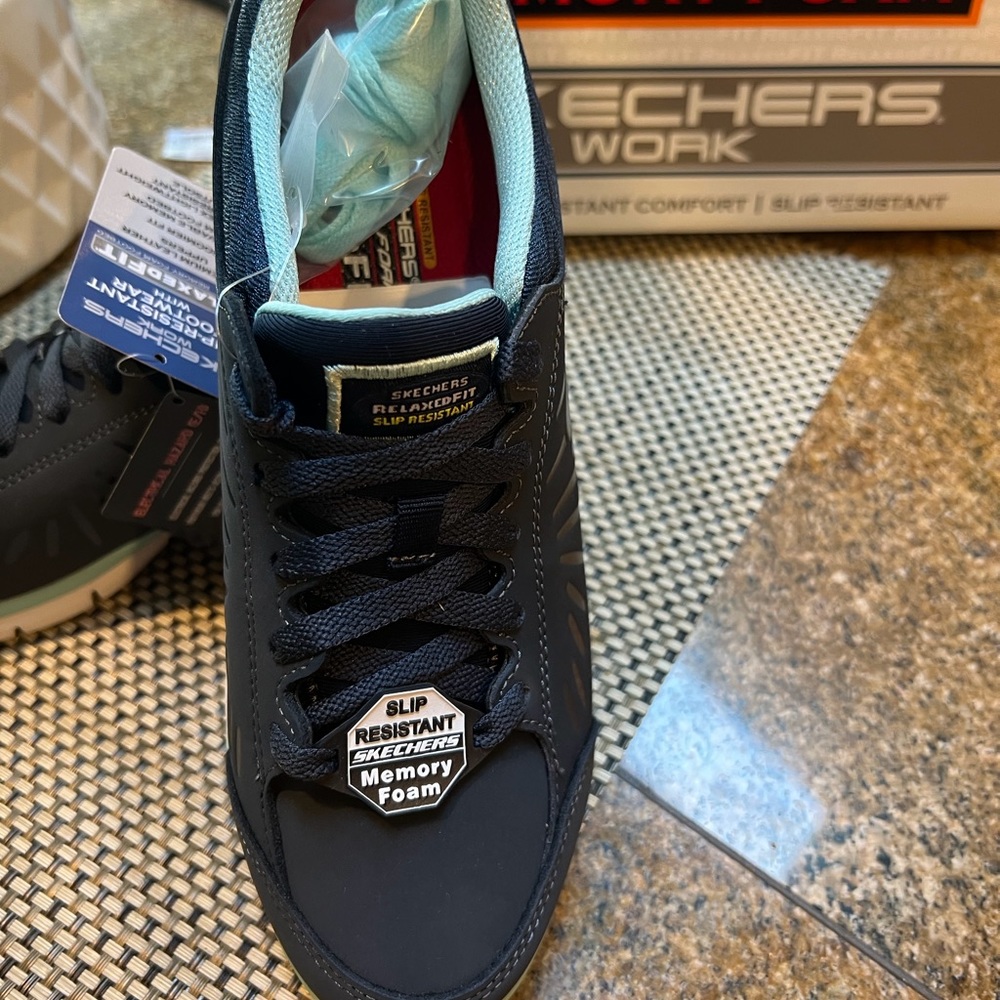 Women’s “Skechers” tennis shoe “Stacy” in Navy/Aqua. Size 8.5. NIB